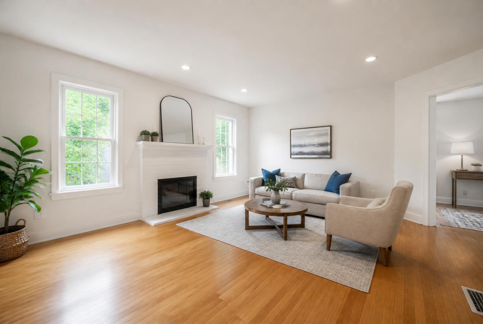 A bright, clean living room in a well-maintained attainable home